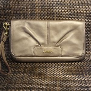 Coach bronze wristlet